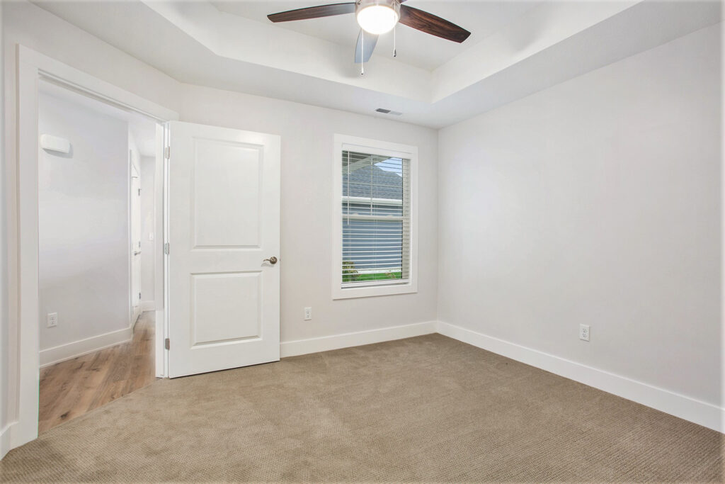 A carpeted bedroom